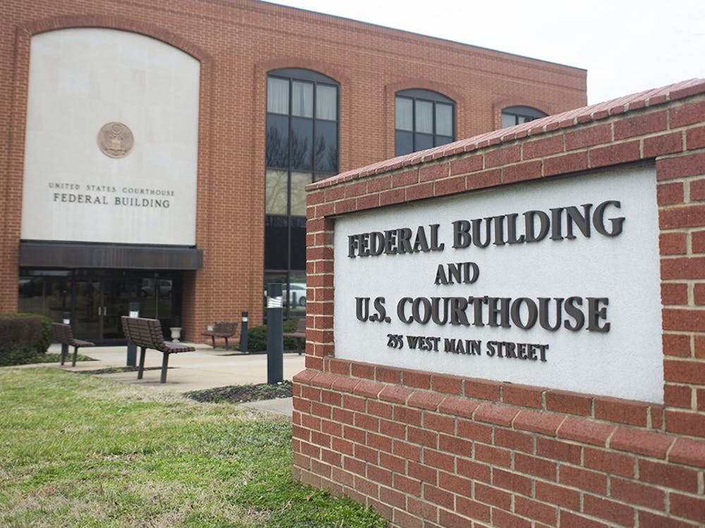 Due to pandemic concerns, only the judge, jury, courtroom officials, plaintiff, defendants and attorneys are allowed in the courthouse.