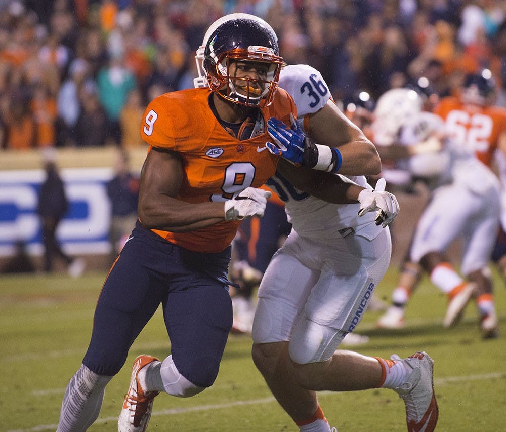 <p>Senior wide receiver Canaan Severin runs a route against Boise State Friday. Severin has averaged 13 yards a reception and 74.5 receiving yards a game through four contests this season.</p>