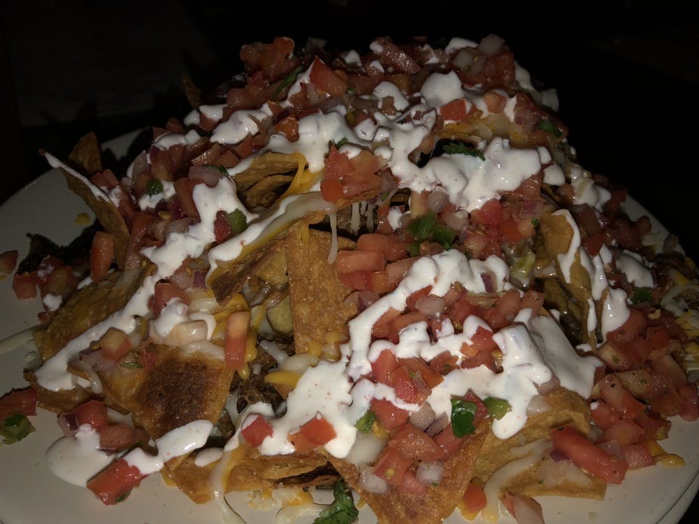 Asado serves classic Mexican dishes like their Fully Loaded Nachos.&nbsp;
