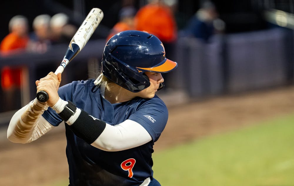 <p>No. 18 Virginia softball continued its winning ways with a narrow victory over in-state opponent Liberty.</p>