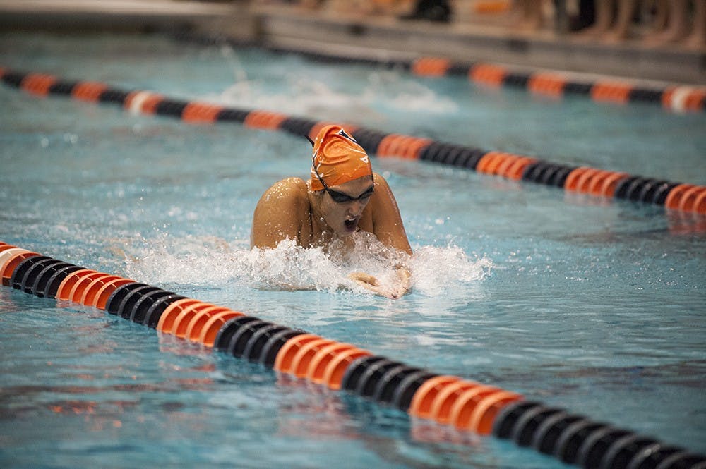 Senior Courtney Bartholomew swept the backstroke events and was part of the 400 medley relay that broke the AFC pool record in the women's win against Tennessee.