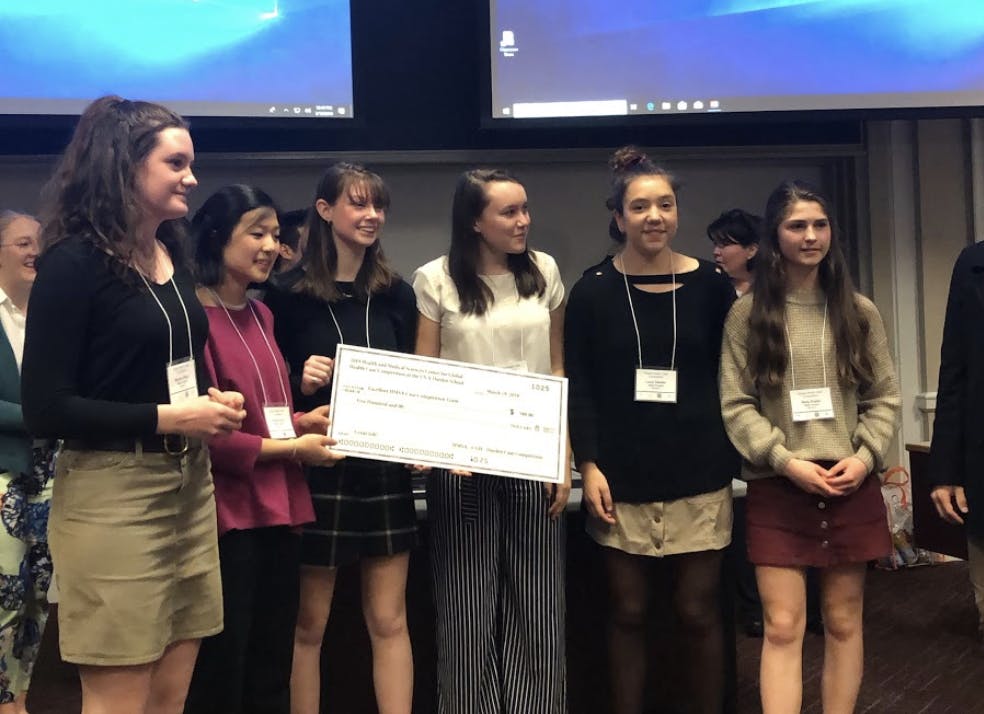 The winning HMSA team received copies of the book “Mountains Beyond Mountains” by Tracy Kidder and $500.&nbsp;