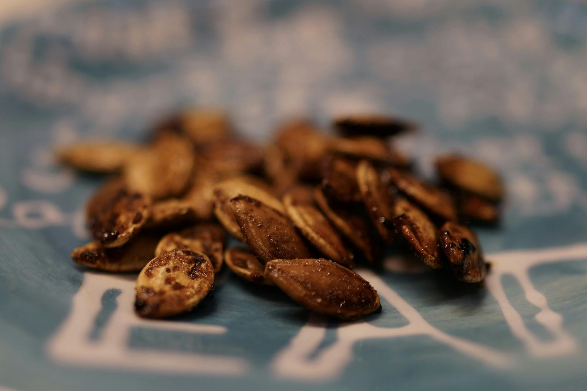 Roasted pumpkin seeds are easy to make, and they can be the perfect snack for second-round midterm cramming.&nbsp;