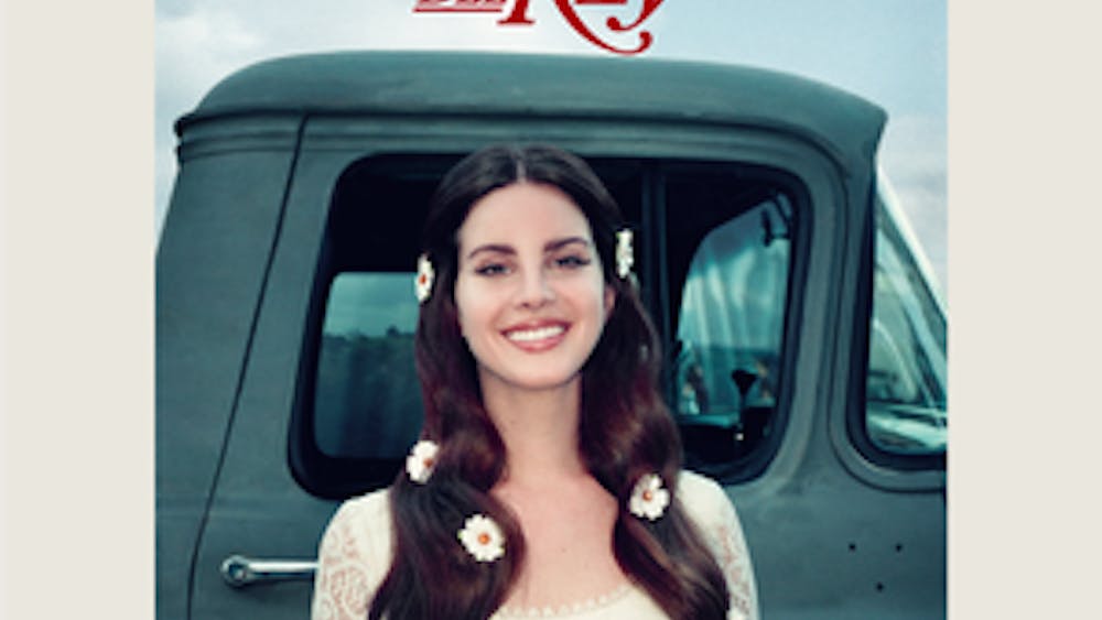 Look no further than the album cover for an appropriate metaphor &mdash; as with all her previous releases, the cover of “Lust for Life” features Del Rey posing in front of a car. Only this time, she actually smiles.