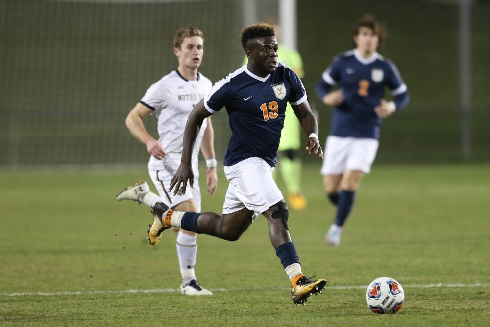 <p>Senior defender Prosper Figbe came close to scoring a goal against Notre Dame Tuesday night.</p>