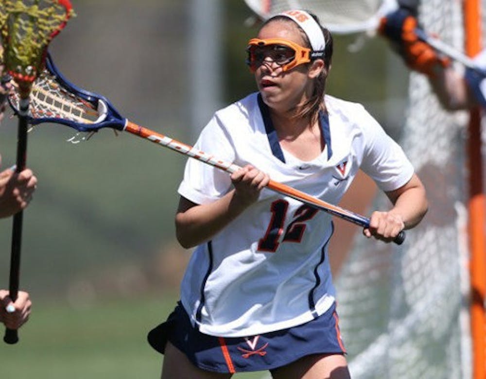 <p>Senior defender Ella Cooper was recognized for senior day in Virginia's last victory against No. 10 Boston College. Cooper then sang the national anthem to being the game, then was&nbsp;a part of the Cavalier&nbsp;defense who kept the Eagles to just four goals at halftime.&nbsp;</p>