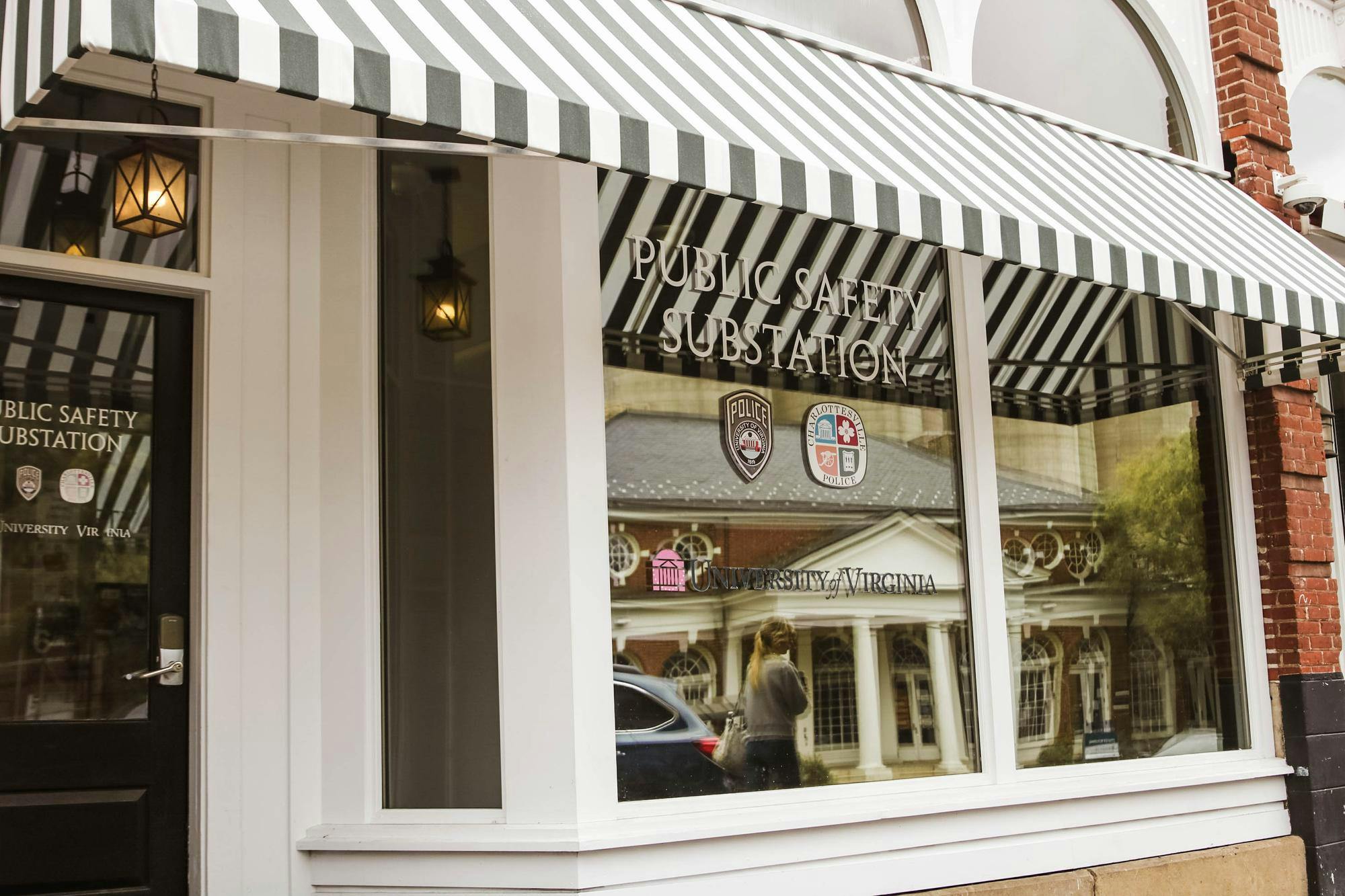 The suspect is wearing a red hoodie and blue sweatpants