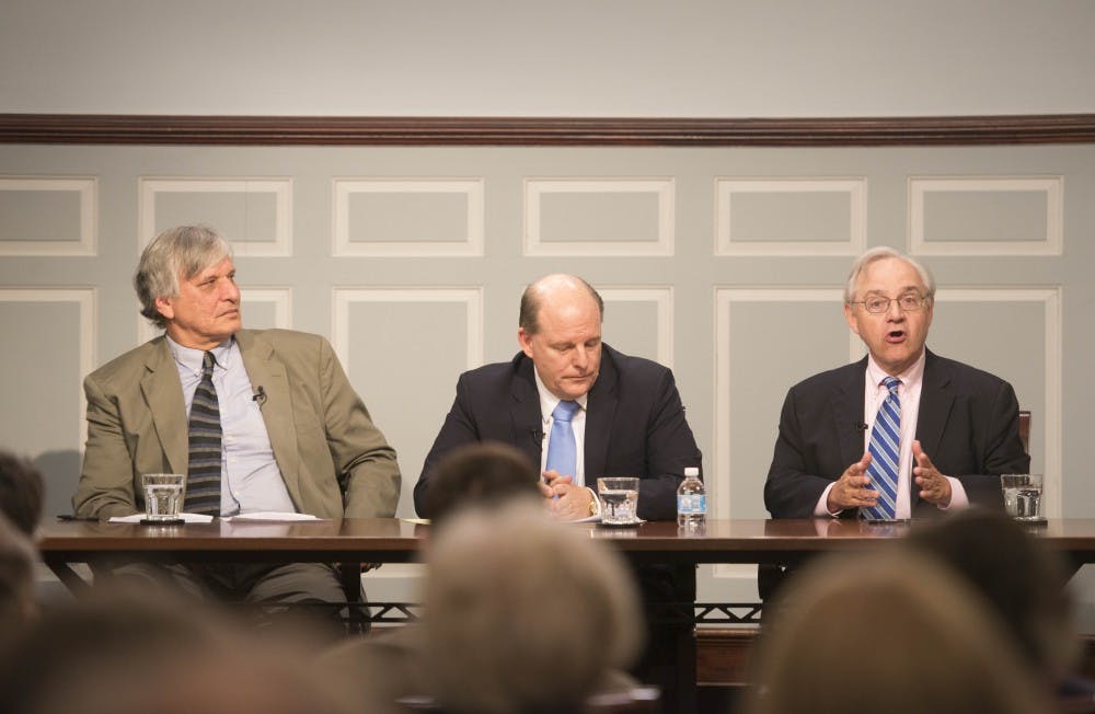 <p>From left to right: Panel moderator Brian Balogh, a professor of history at the University and the Miller center; Peter Wehner, &nbsp;a senior fellow of the ethics and public policy center; and E.J. Dionne, a senior fellow at the Brookings Institute.&nbsp;</p>
