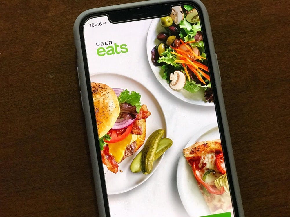 Uber Eats is available through an app on your phone.