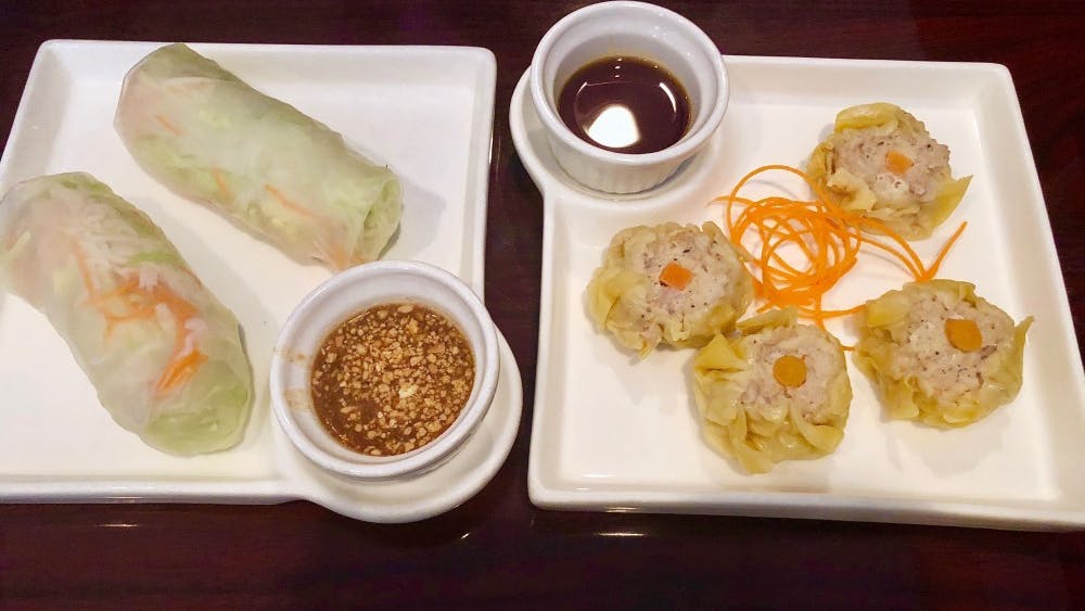 To the left is the Fresh Vegetables Rolls and to the right the Kanom Jeeb — both appetizers offered for under $6.&nbsp;