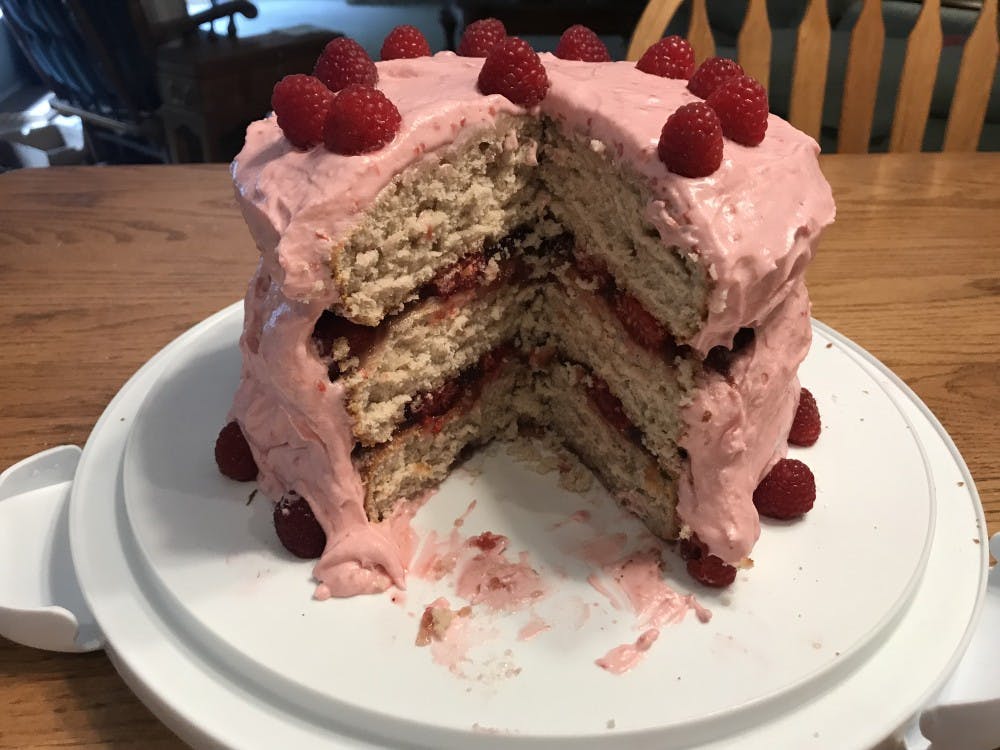 <p>A cake with three layers of raspberries and raspberry preserves can be great for any summer gathering.&nbsp;</p>