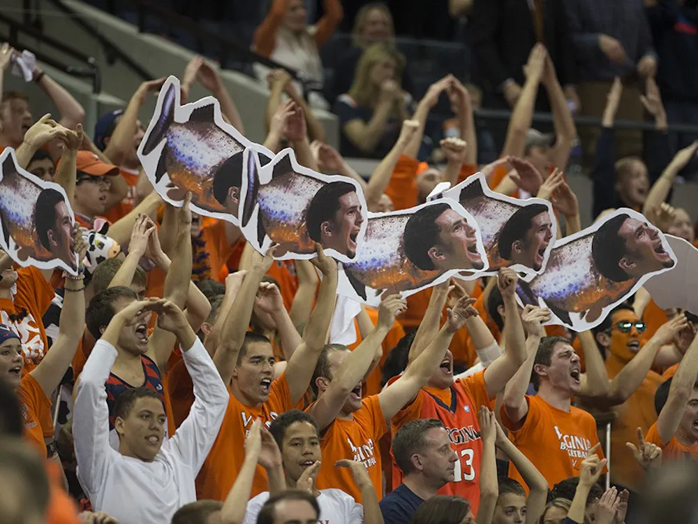 The University's student cheer section, Hoo Crew, aims to create an atmosphere of comradery and positivity in the stands at sports games.