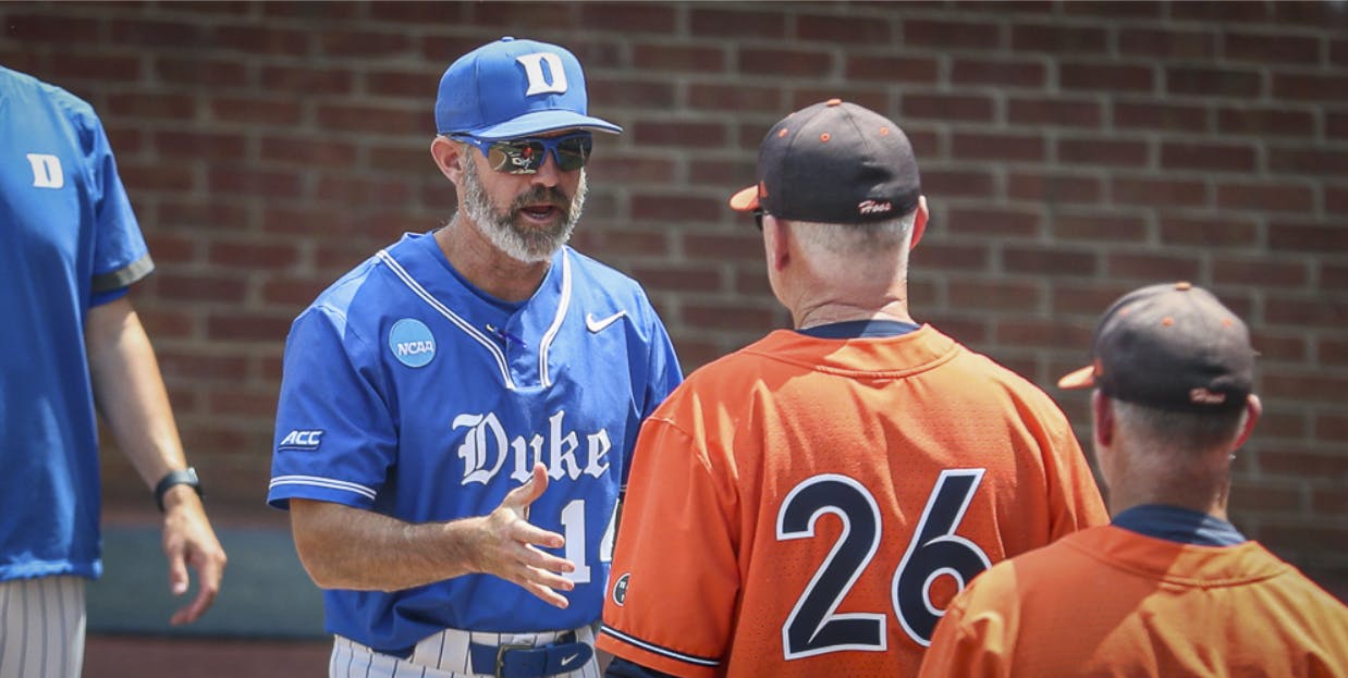 Chris Pollard and Brian O'Connor talk at Disharoon Park.