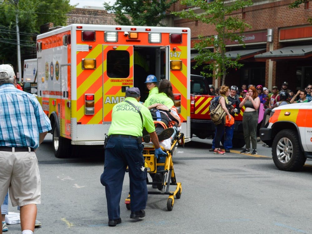 Medical personnel helping someone who was injured when a car plowed through a crowd of people&nbsp;near the Downtown Mall.&nbsp;