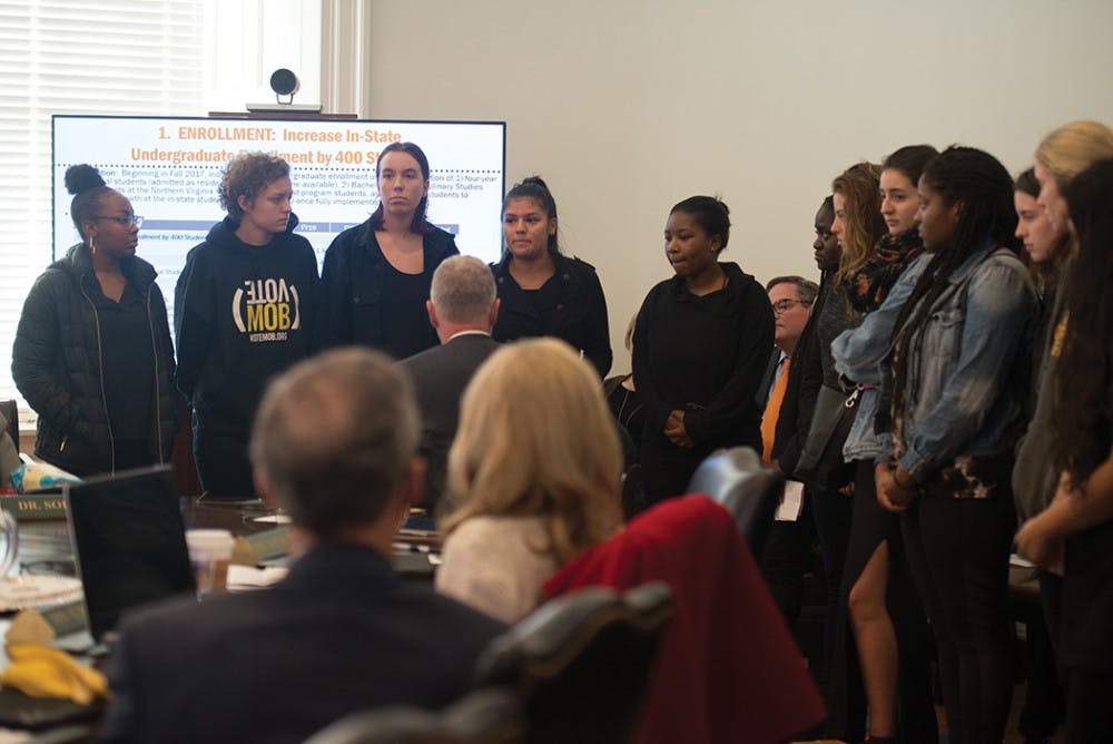 Students protest at the Board of Visitors meeting