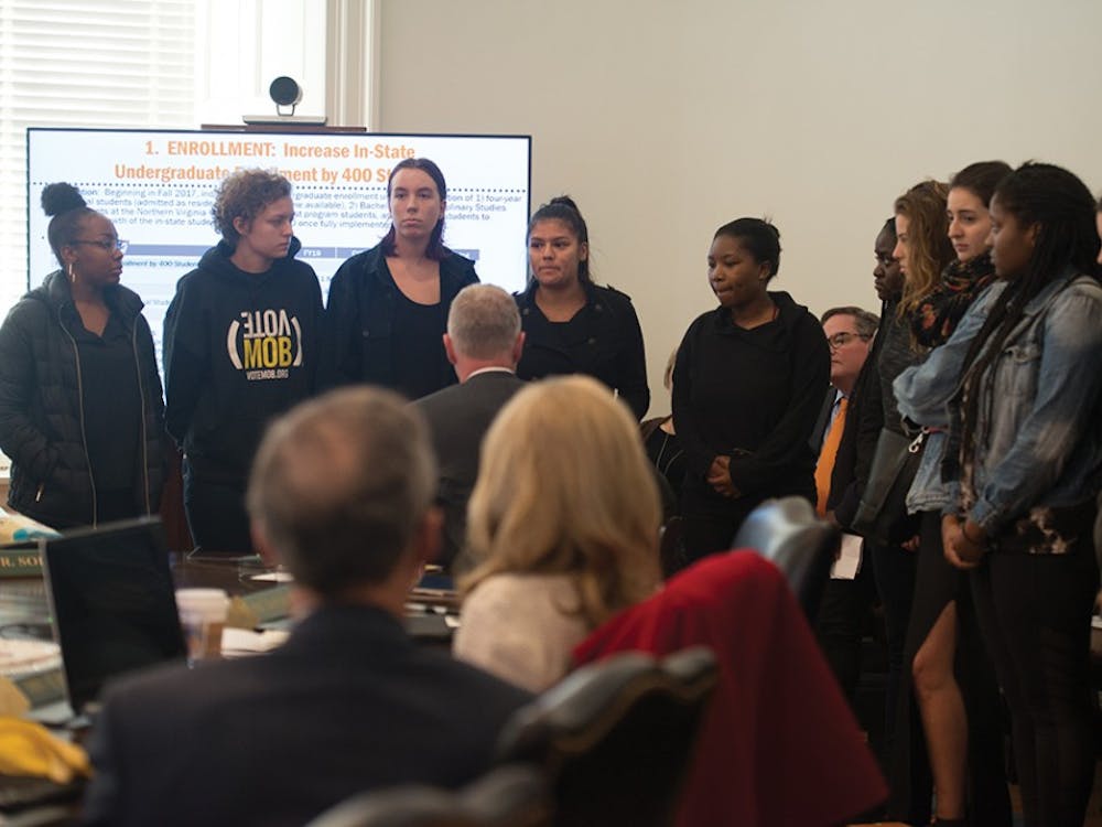 Students protest at the Board of Visitors meeting