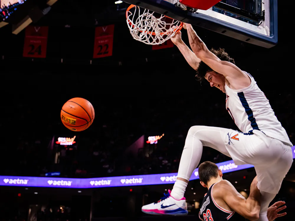 Sophomore forward Blake Buchanan throws down a ferocious dunk against Campbell Nov. 6.