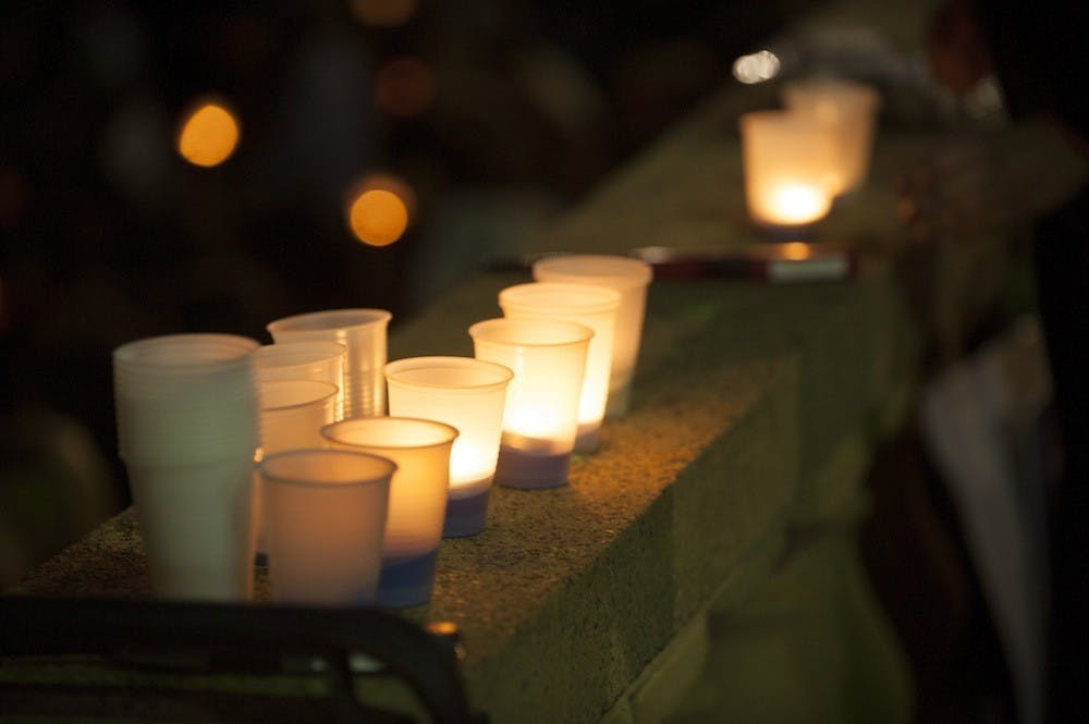 <p>As the sun set Friday night, dozens gathered for a candlelight vigil at Ern Commons, where survivors of sexual assault and abuse, loved ones of survivors and allies from both the University and the greater Charlottesville communities gathered to share their stories.</p>
