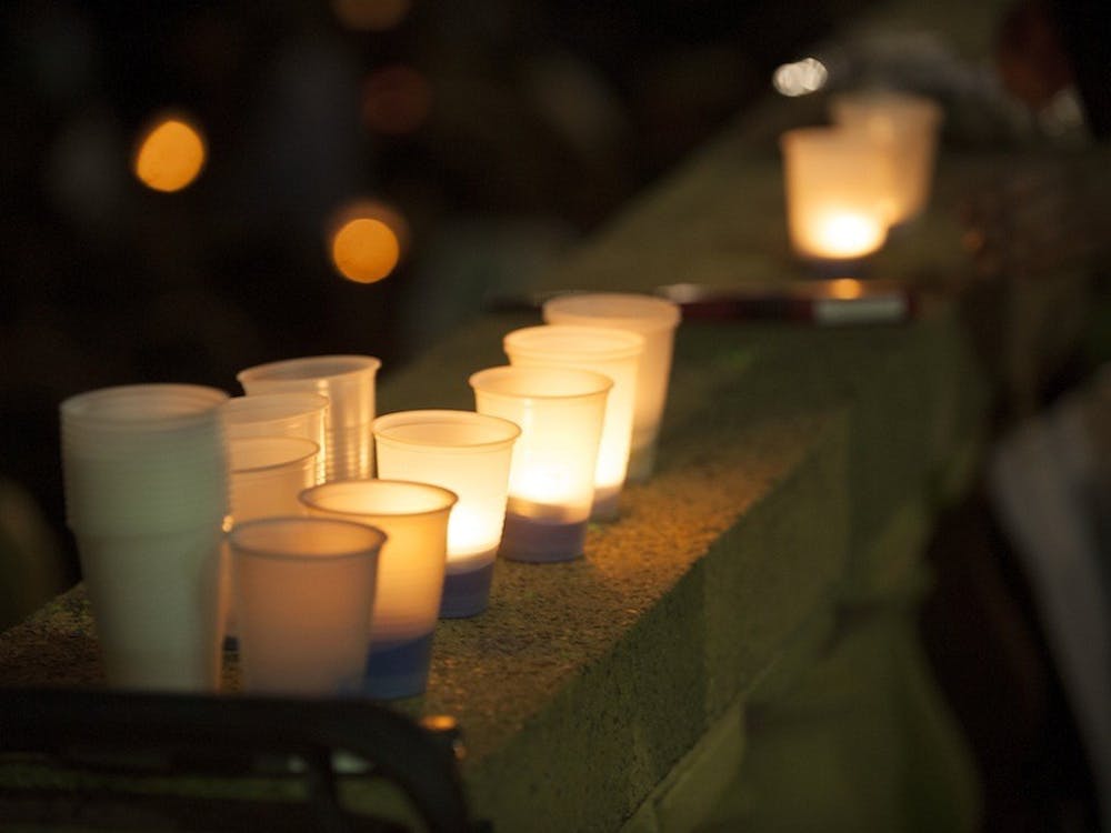 As the sun set Friday night, dozens gathered for a candlelight vigil at Ern Commons, where survivors of sexual assault and abuse, loved ones of survivors and allies from both the University and the greater Charlottesville communities gathered to share their stories.