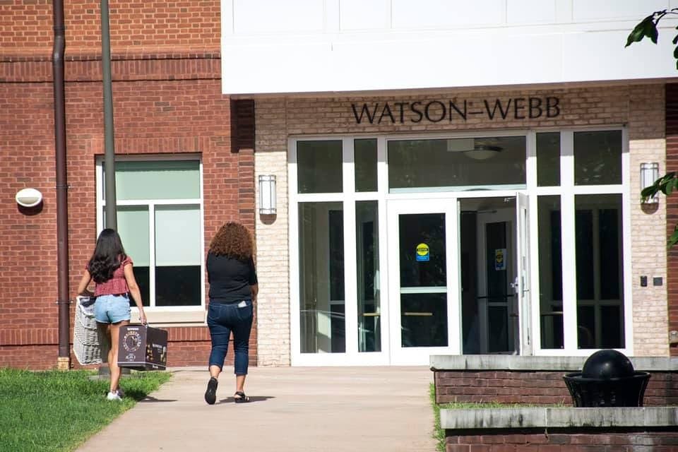 Many resident advisors are living in first-year dorms — sharing communal bathrooms and the close-quarters living situations.