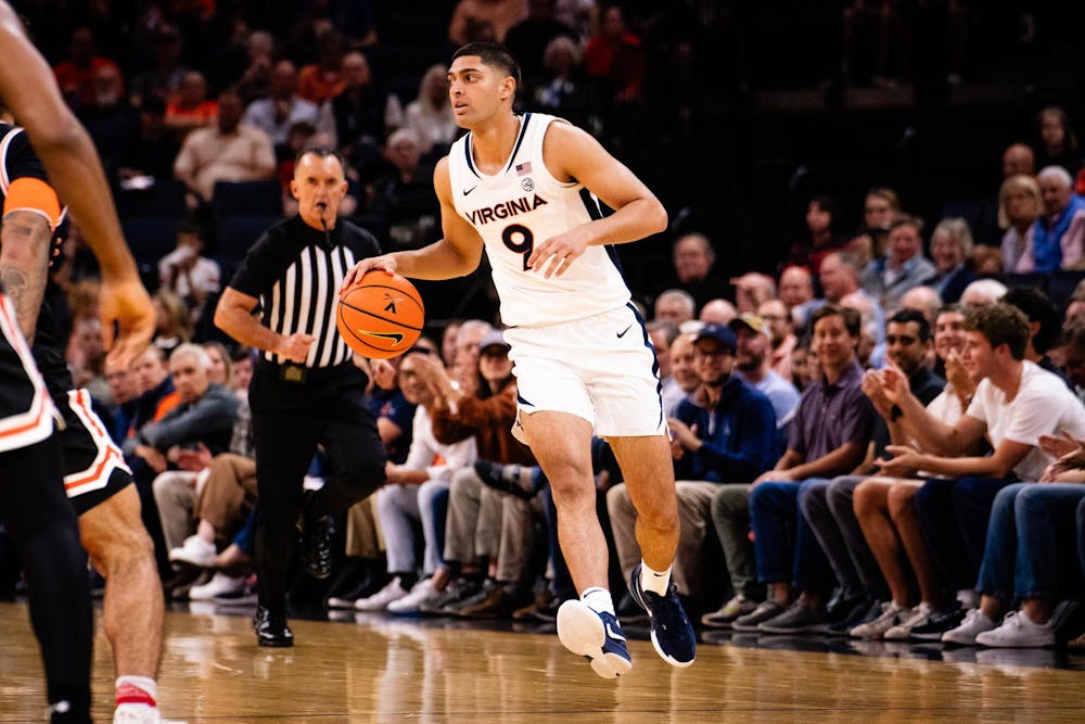 Sharma dribbles upcourt during a game earlier this season against Campbell.