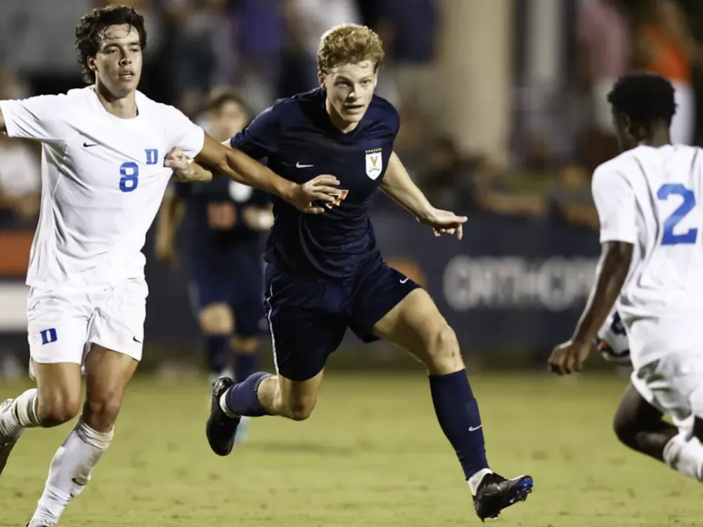 Graduate forward Hayes Wood battles a Duke defender.