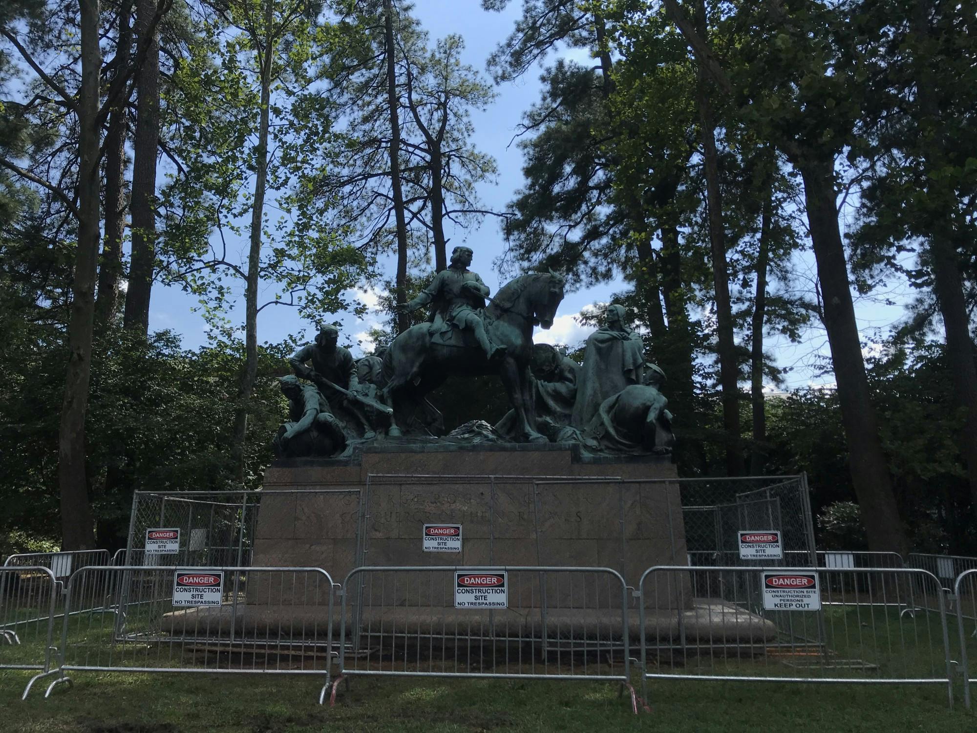 On Thursday, after sustaining damage to Clark's neck, the statue was surrounded with construction fencing and guarded by an Ambassador.