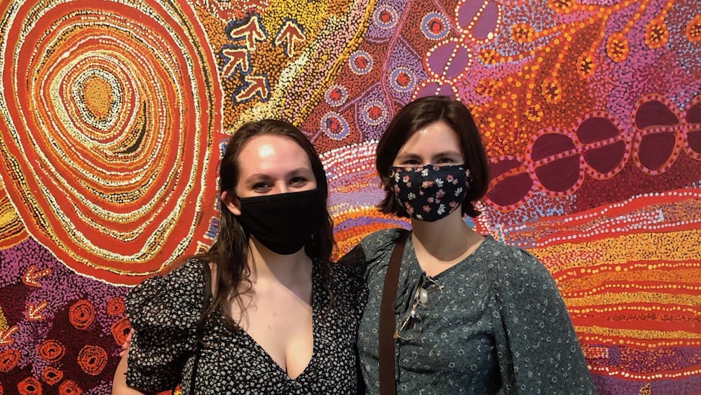 College graduates Ashley Botkin and Addie Patrick co-curated the Kluge-Ruhe Aboriginal Art Collection's exhibit “From Little Things Big Things Grow" along with Henry Skerritt, the Curator of Indigenous Arts of Australia at the Kluge-Ruhe.
