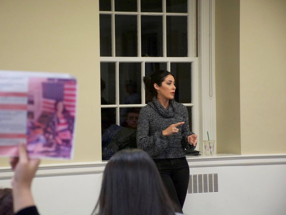 Paulina spoke in detail to the 40-person audience — more than half student protesters — about how a past home burglary incident convinced her to apply for a conceal carry permit.