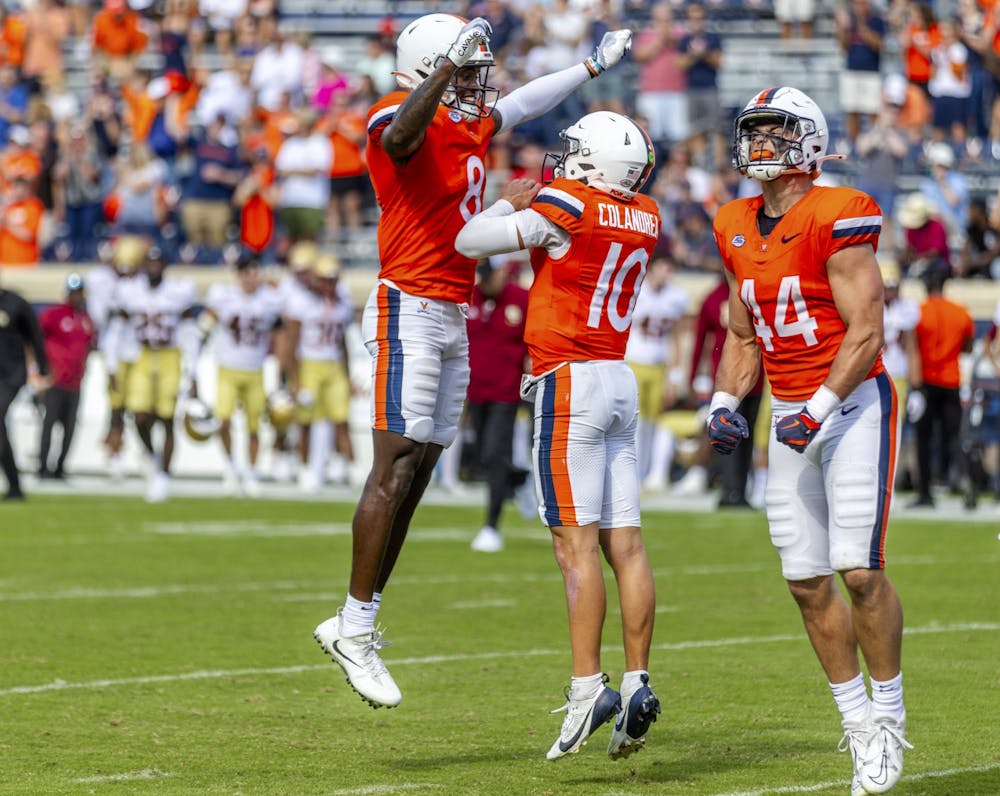 The Cavaliers celebrate a touchdown against Boston College, Oct. 5.