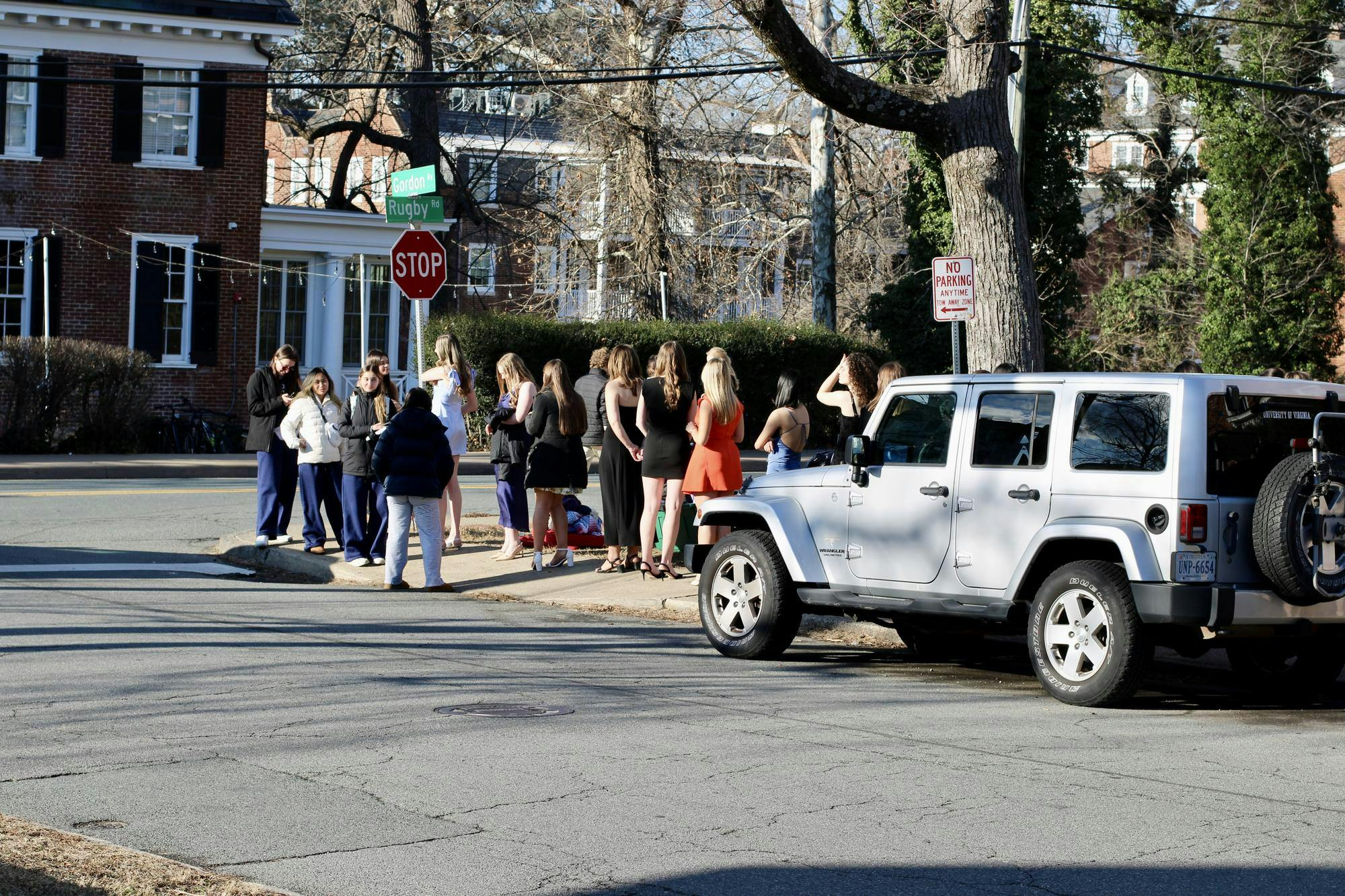 Female students wait outside Alpha Delta Pi's sorority house during formal Rush.