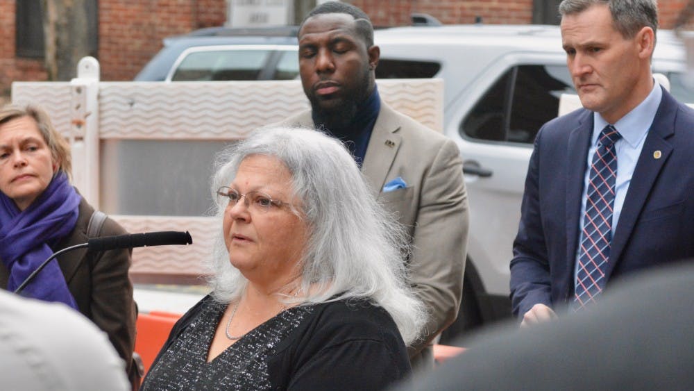 Susan Bro, Heather Heyer's mother, spoke at the dedication ceremony Wednesday morning. Charlottesville City Councilor Kathy Galvin, Vice Mayor Wes Bellamy and Mayor Mike Signer are pictured behind her from left to right.&nbsp;