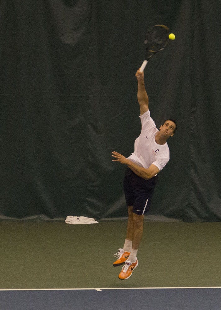 	No. 24 senior Alex Domijan rebounded after dropping the first set against No. 82 Clemson junior Hunter Harrington, winning the next two to clinch the match for the Cavaliers.