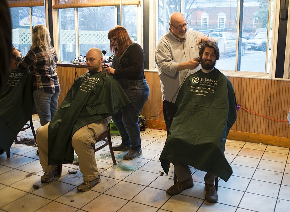 <p>Thursday night at the Biltmore, 75 volunteers shaved their heads to raise a total of $42,571 for childhood cancer research.</p>