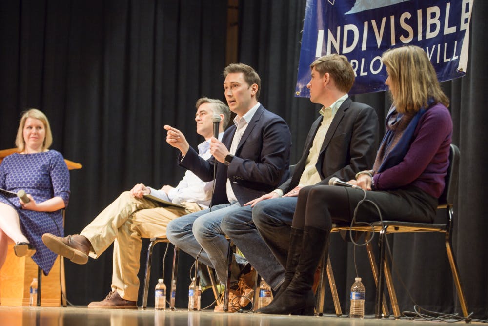 From left, candidates Andrew Sneathern, Roger Dean Huffstetler, Ben Cullop and Leslie Cockburn speak at a public debate March 17