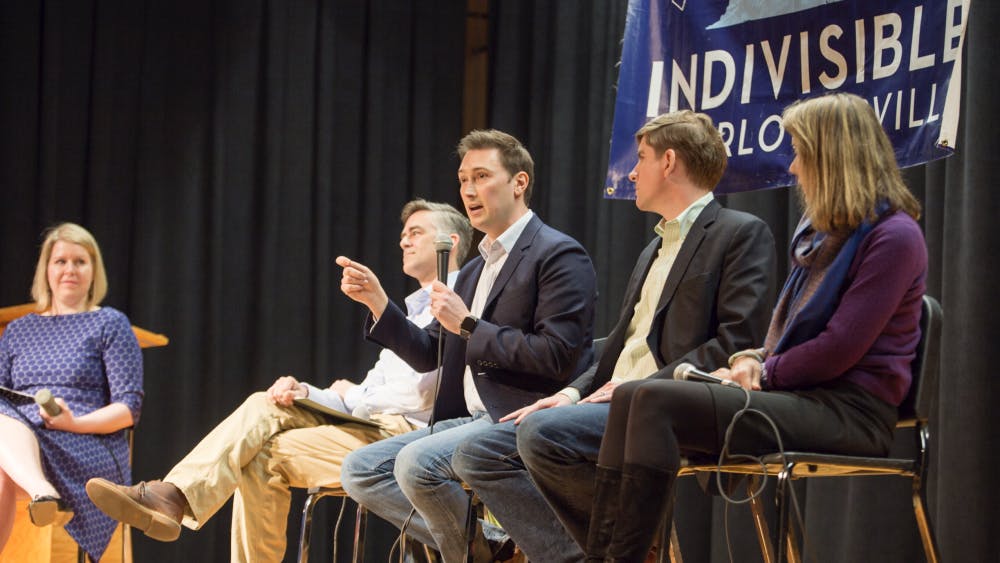 From left, candidates Andrew Sneathern, Roger Dean Huffstetler, Ben Cullop and Leslie Cockburn speak at a public debate March 17