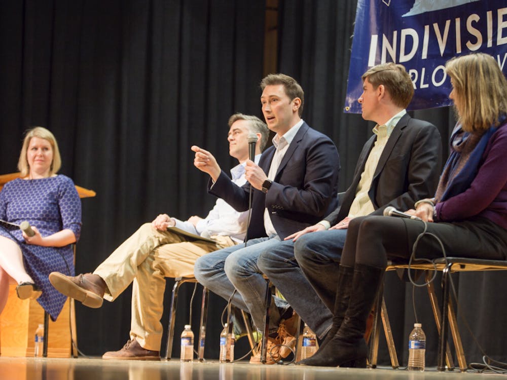 From left, candidates Andrew Sneathern, Roger Dean Huffstetler, Ben Cullop and Leslie Cockburn speak at a public debate March 17