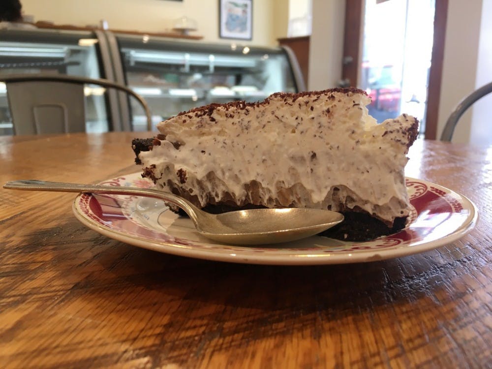 The dark chocolate cream pie has an Oreo-like crust and a dark chocolate, extremely thick and creamy center.
