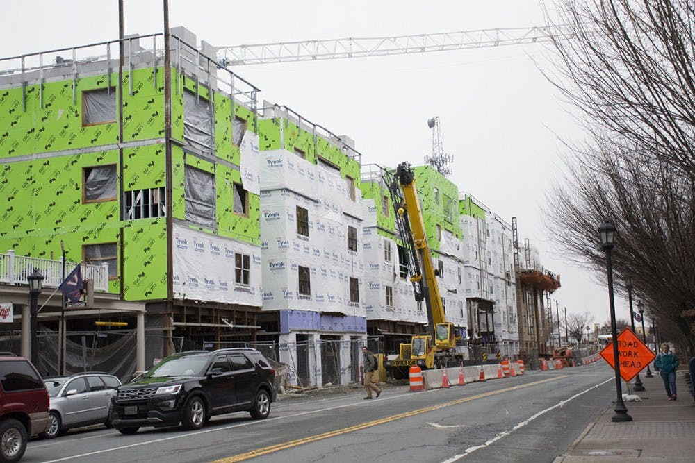 <p>Construction of The Standard apartment building, advertised as premiere student housing, is underway on West Main Street.</p>