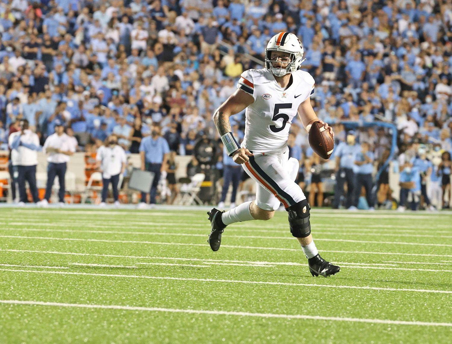 Virginia junior quarterback Brennan Armstrong set a school record against North Carolina with over 550 passing yards.