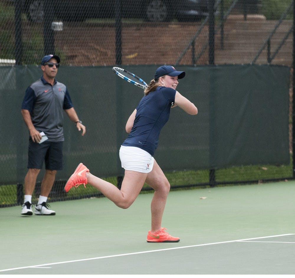 <p>Junior Cassie Mercer took a point for the Cavaliers in singles play against NC State&nbsp;Friday.</p>