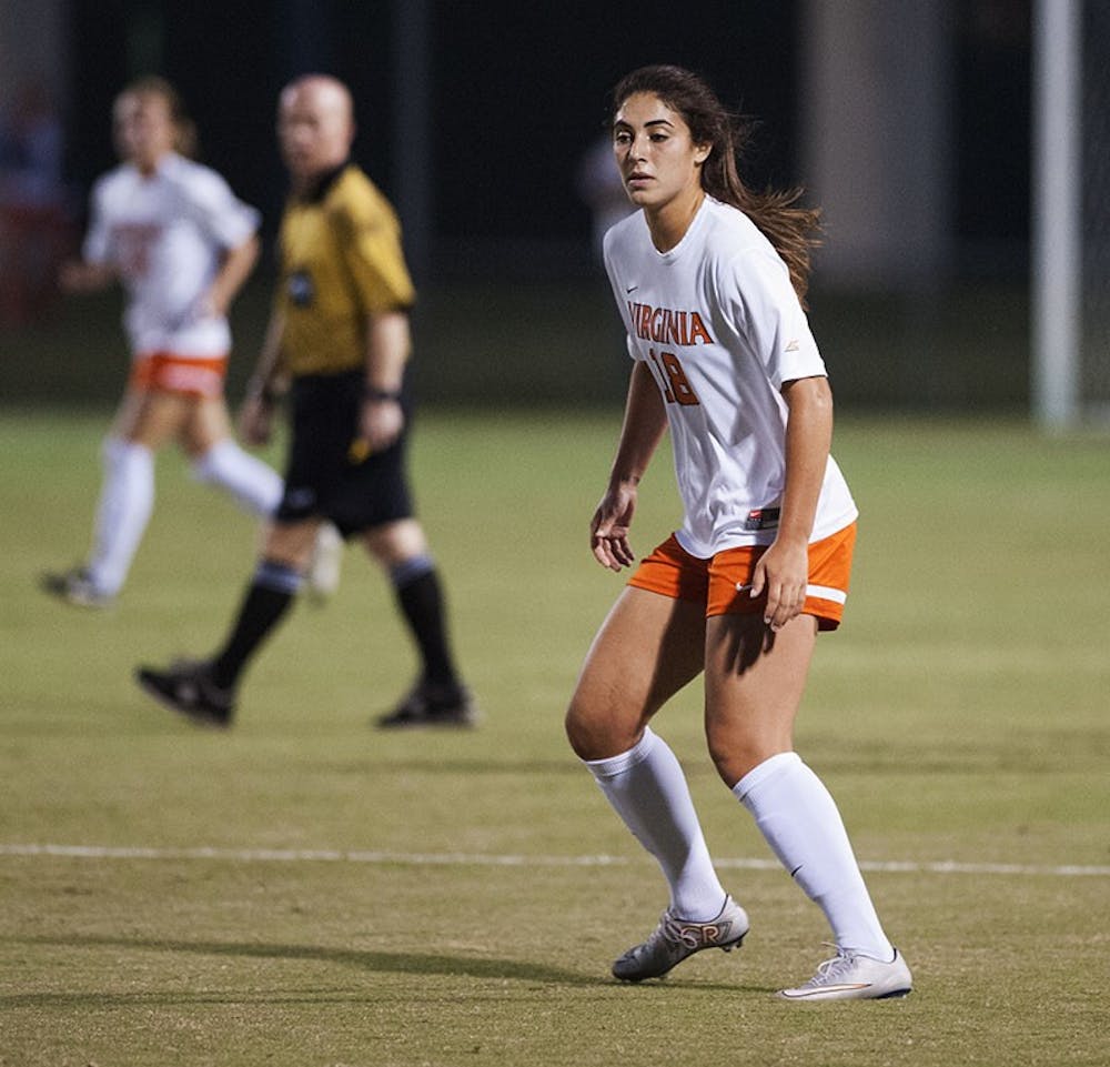 <p>Junior forward Morgan Reuther evened the match at 1 with her late goal, but Notre Dame controlled the minutes after regulation, registering four shots to Virginia's zero. </p>