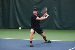 Freshman Mans Dahlberg returns a volley against Ohio State.