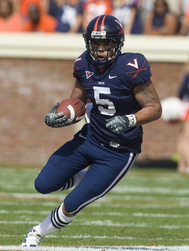 Virginia running back Mikell Simpson (5) in action against ECU.  The Virginia Cavaliers defeated the East Carolina Pirates 35-20 in NCAA football at Scott Stadium on the Grounds of the University of Virginia in Charlottesville, VA on October 11, 2008.