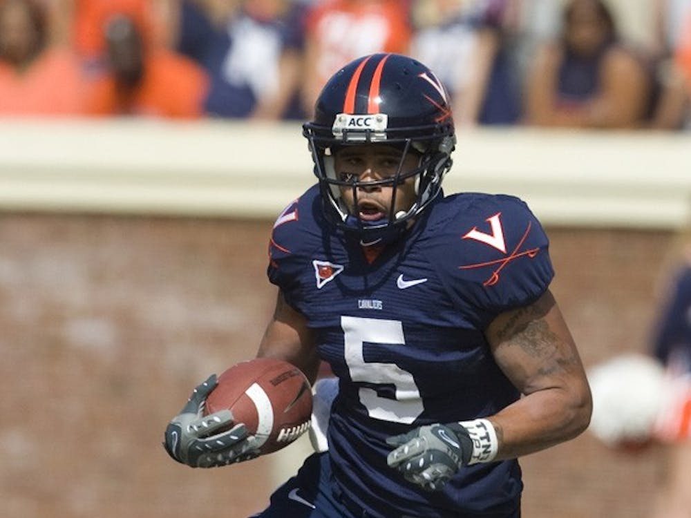 Virginia running back Mikell Simpson (5) in action against ECU. The Virginia Cavaliers defeated the East Carolina Pirates 35-20 in NCAA football at Scott Stadium on the Grounds of the University of Virginia in Charlottesville, VA on October 11, 2008.