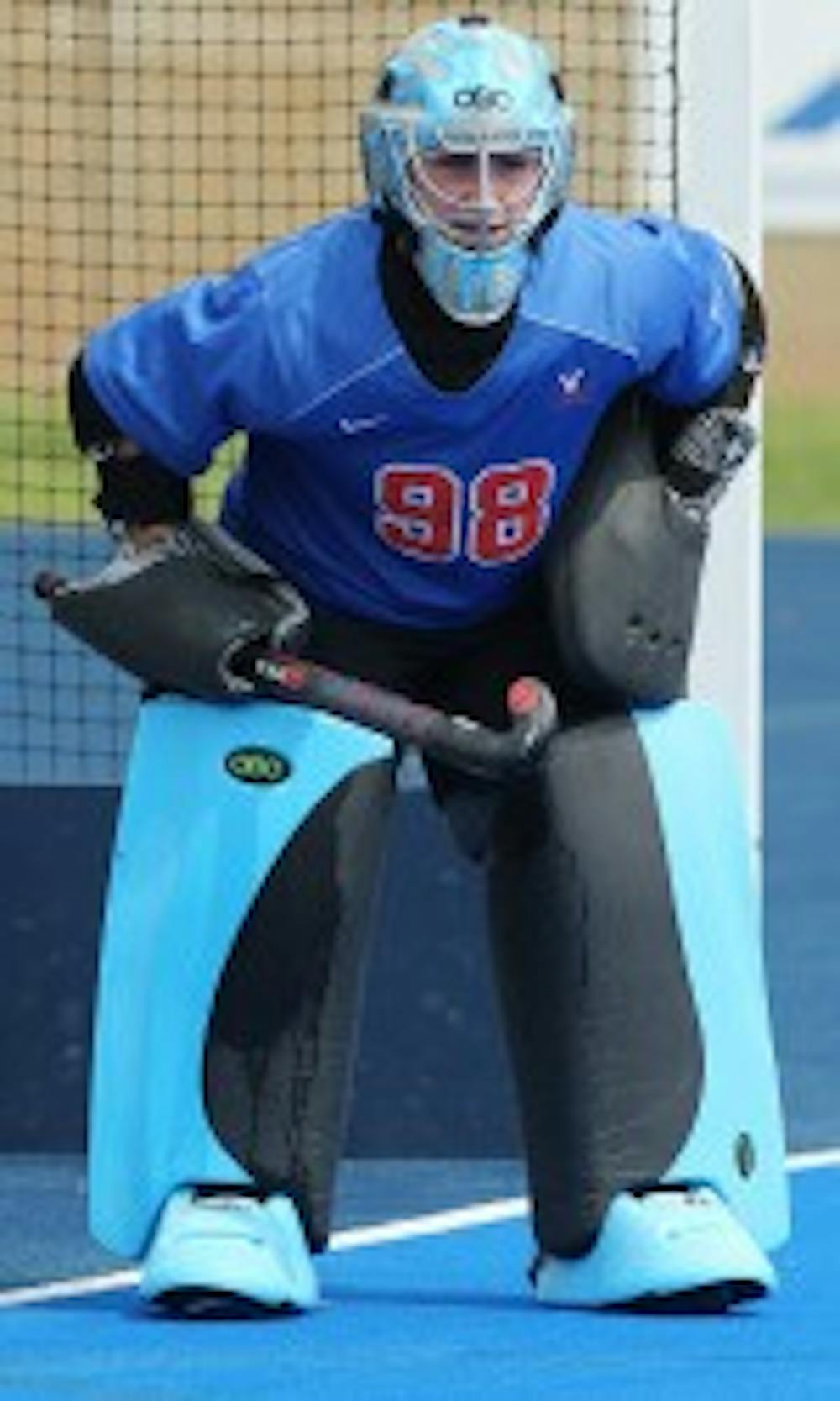 <p>Rather than using her pads to protect the net, then-junior goalkeeper Rebecca Holden&nbsp;chose to&nbsp;protect&nbsp;Syracuse midfielder&nbsp;Hurff.</p>