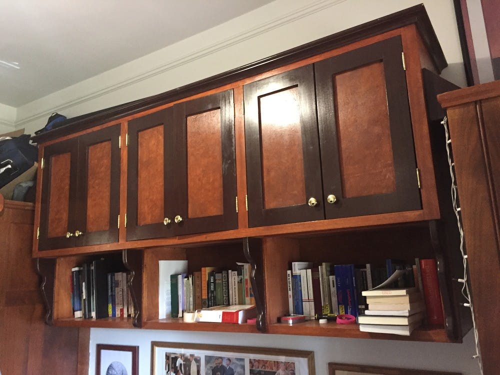 A custom cabinet in the Lawn&nbsp;room of fourth-year College student John Connolly.&nbsp;