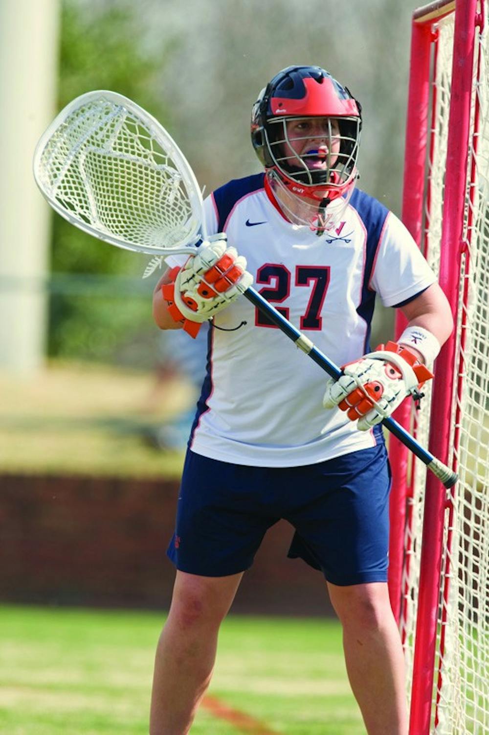 Virginia goalkeeper Lauren Benner (27).  The #2 ranked Virginia Cavaliers women's lacrosse team defeated the Penn State Nittany Lions 12-11 in overtime at Klockner Stadium on the Grounds of the University of Virginia in Charlottesville, VA on March 7, 2009.