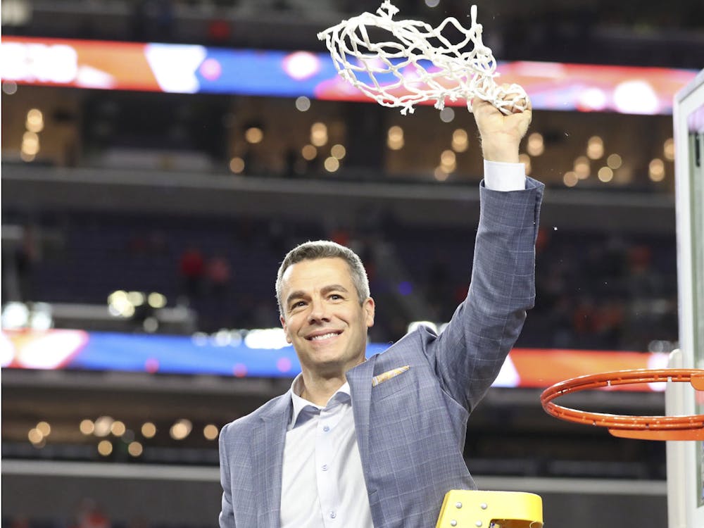 Bennett cuts down the championship net.