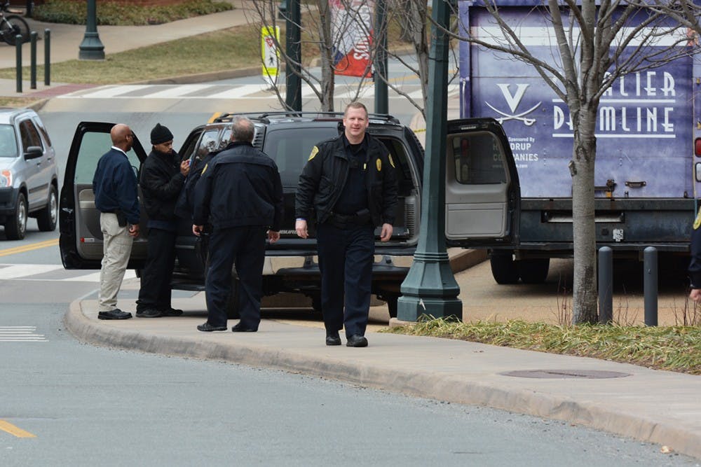 Reporters from The Cavalier Daily observed police moving what appeared to be a body bag into a vehicle around 1:00 p.m.